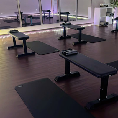 benched, mats, and equipment at our studio